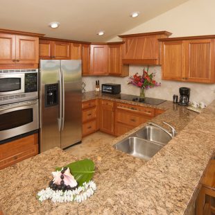 Modern Kitchen with brushed aluminum appliances.